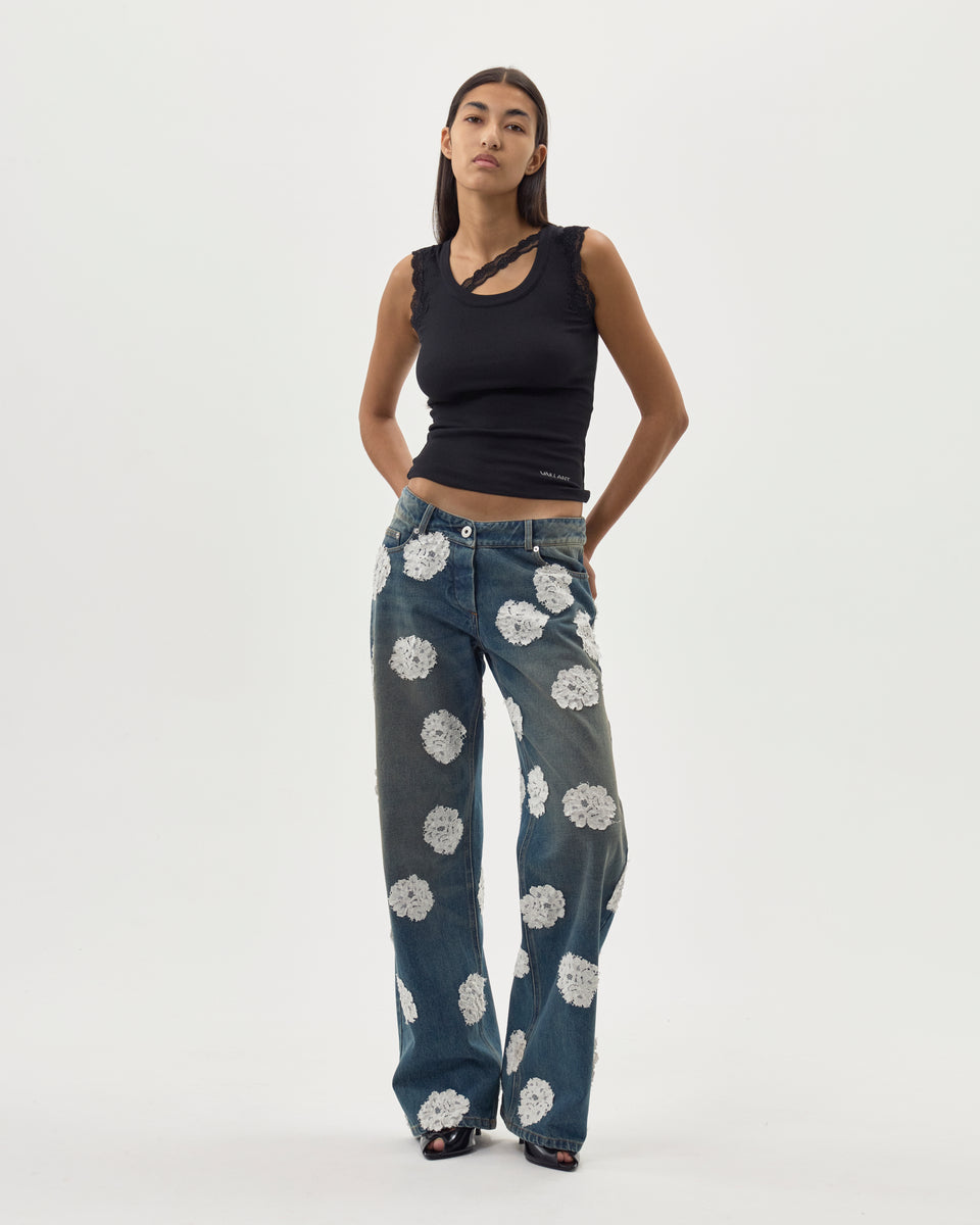 WASHED AND STAINED DENIM JEANS W/ LACE POLKA DOTS - PRE ORDER