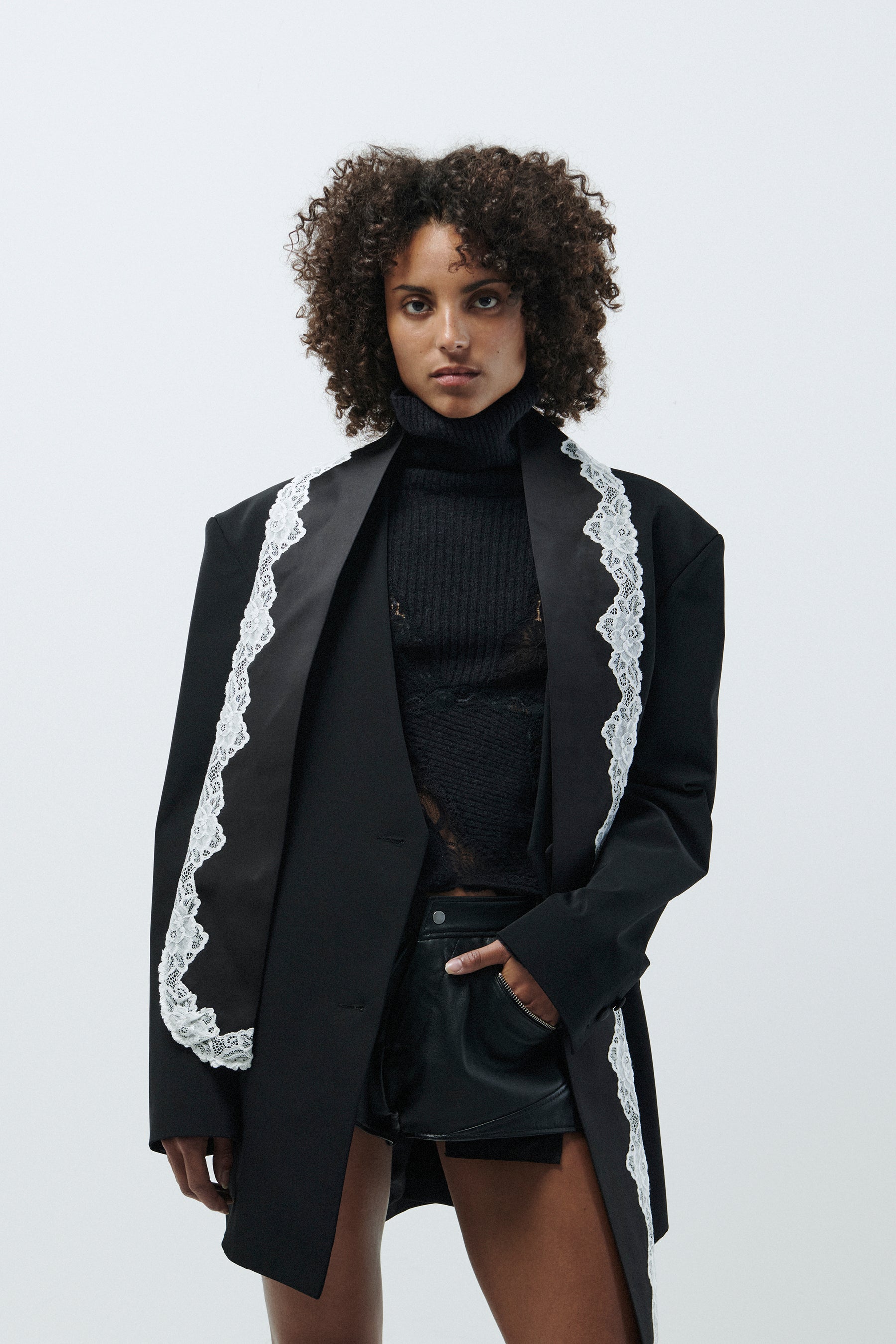 KNIT BLACK TURTLENECK WITH LACE DETAILS