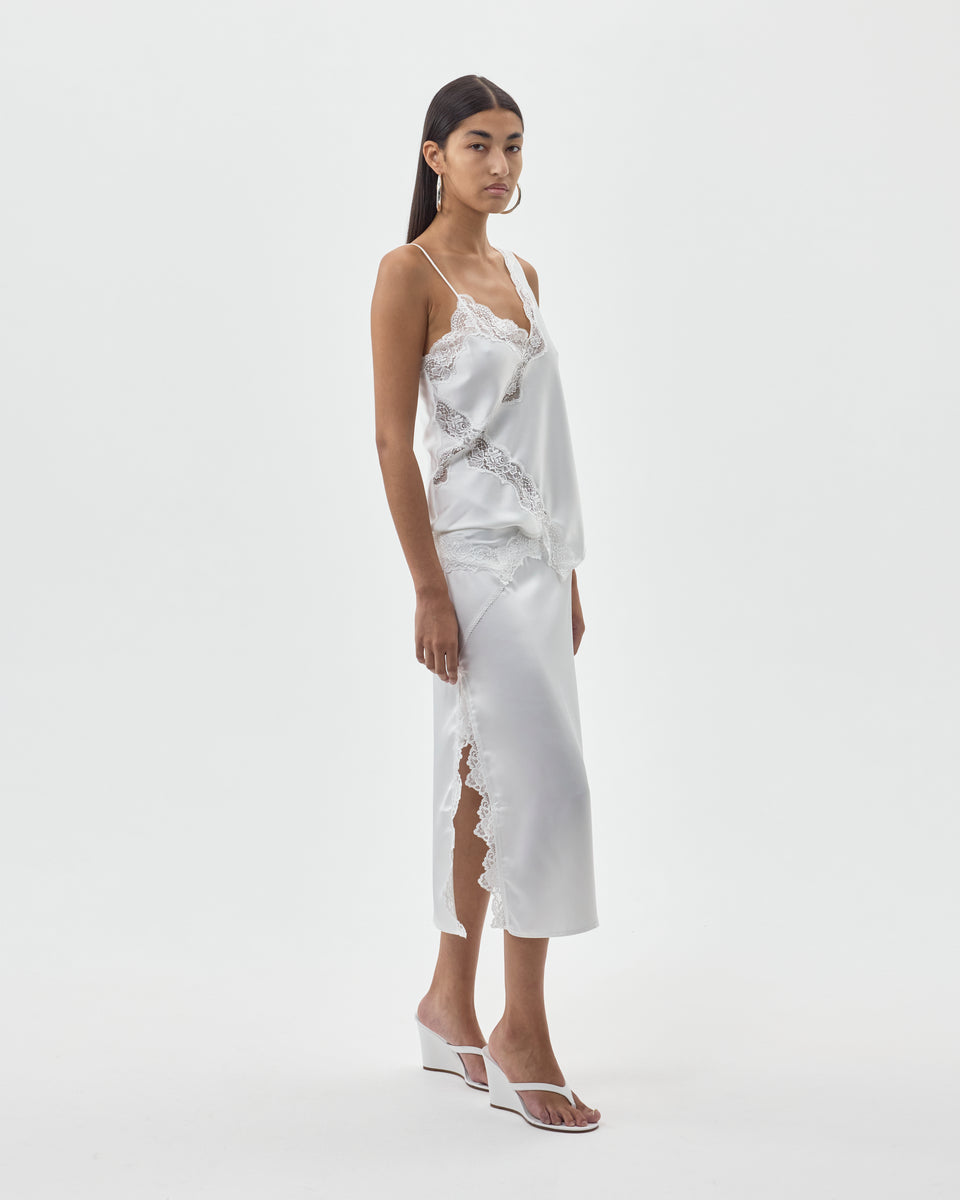 SKIRT WITH LACE DETAILS AND SIDE SLITS