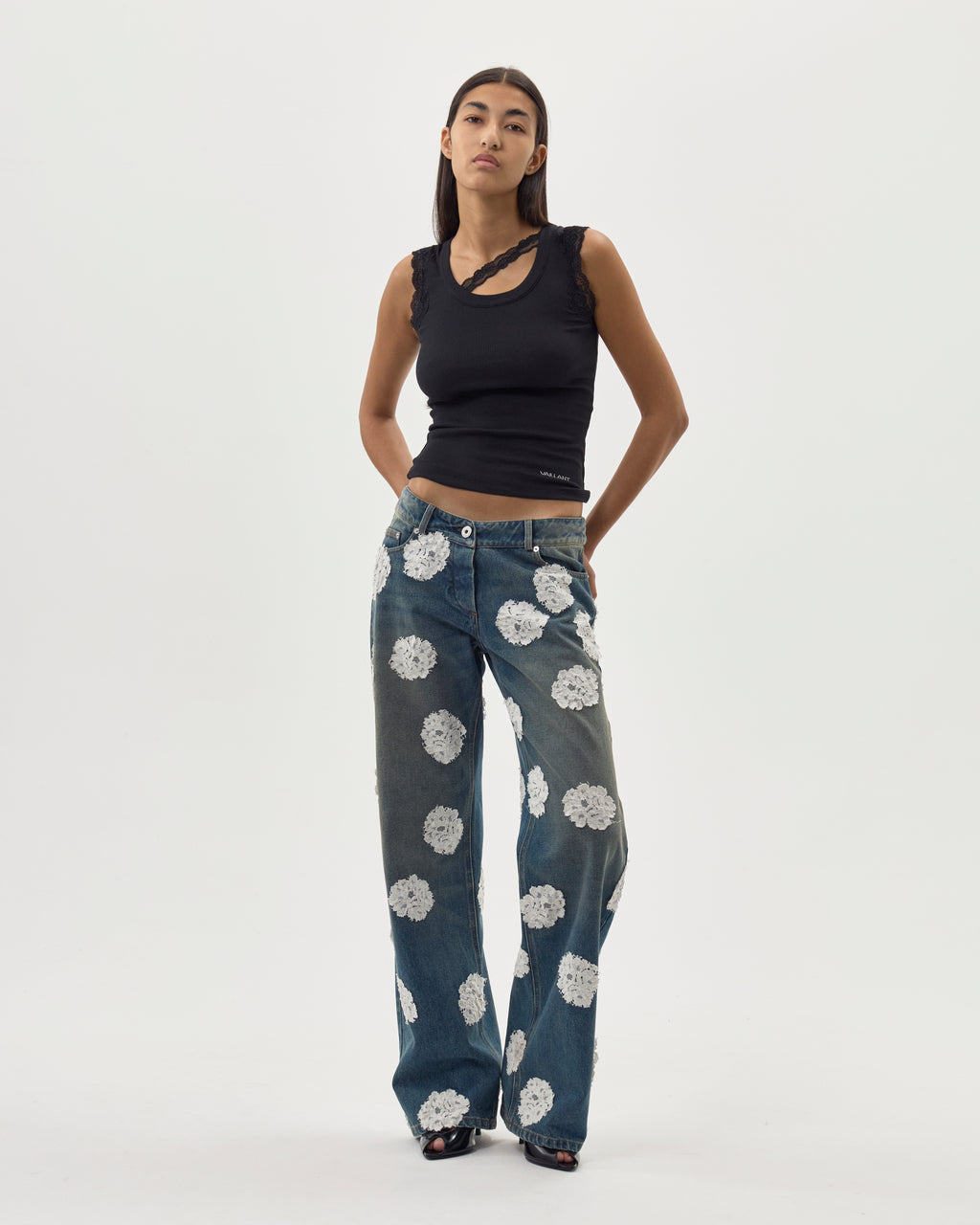 WASHED AND STAINED DENIM JEANS W/ LACE POLKA DOTS - PRE ORDER