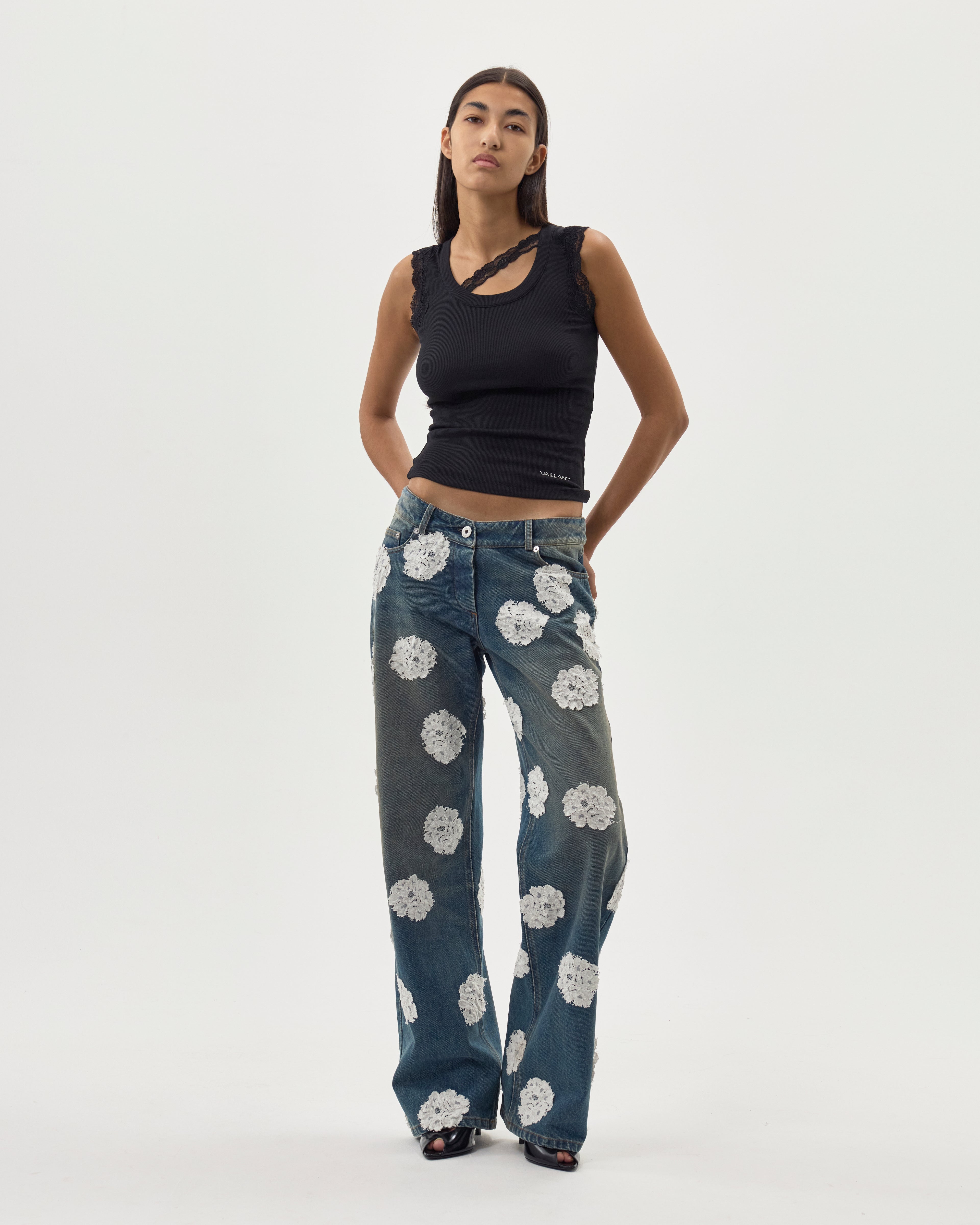 WASHED AND STAINED DENIM JEANS W/ LACE POLKA DOTS - PRE ORDER