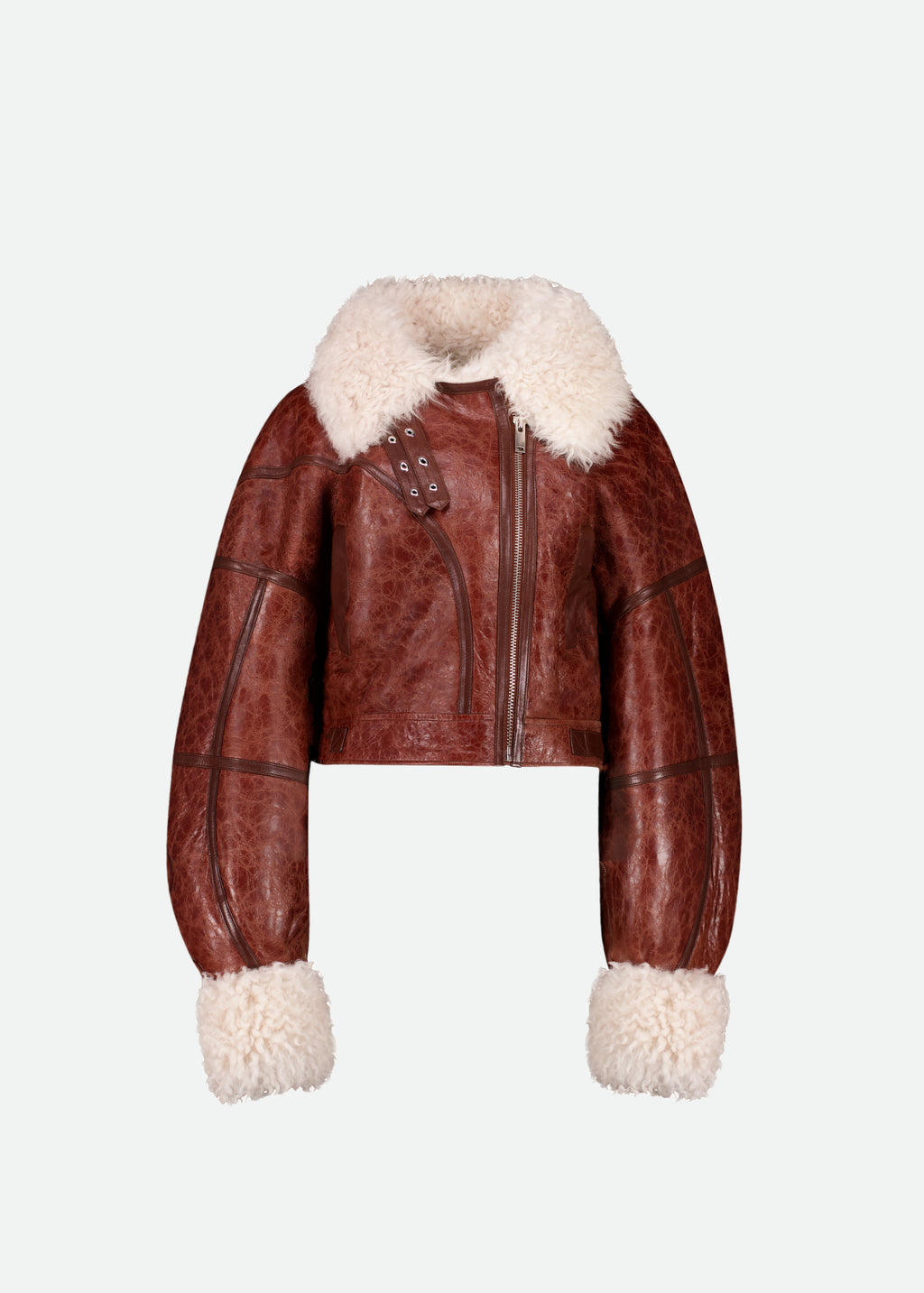 Vaillant Brown leather jacket with white fur trim on a light gray background