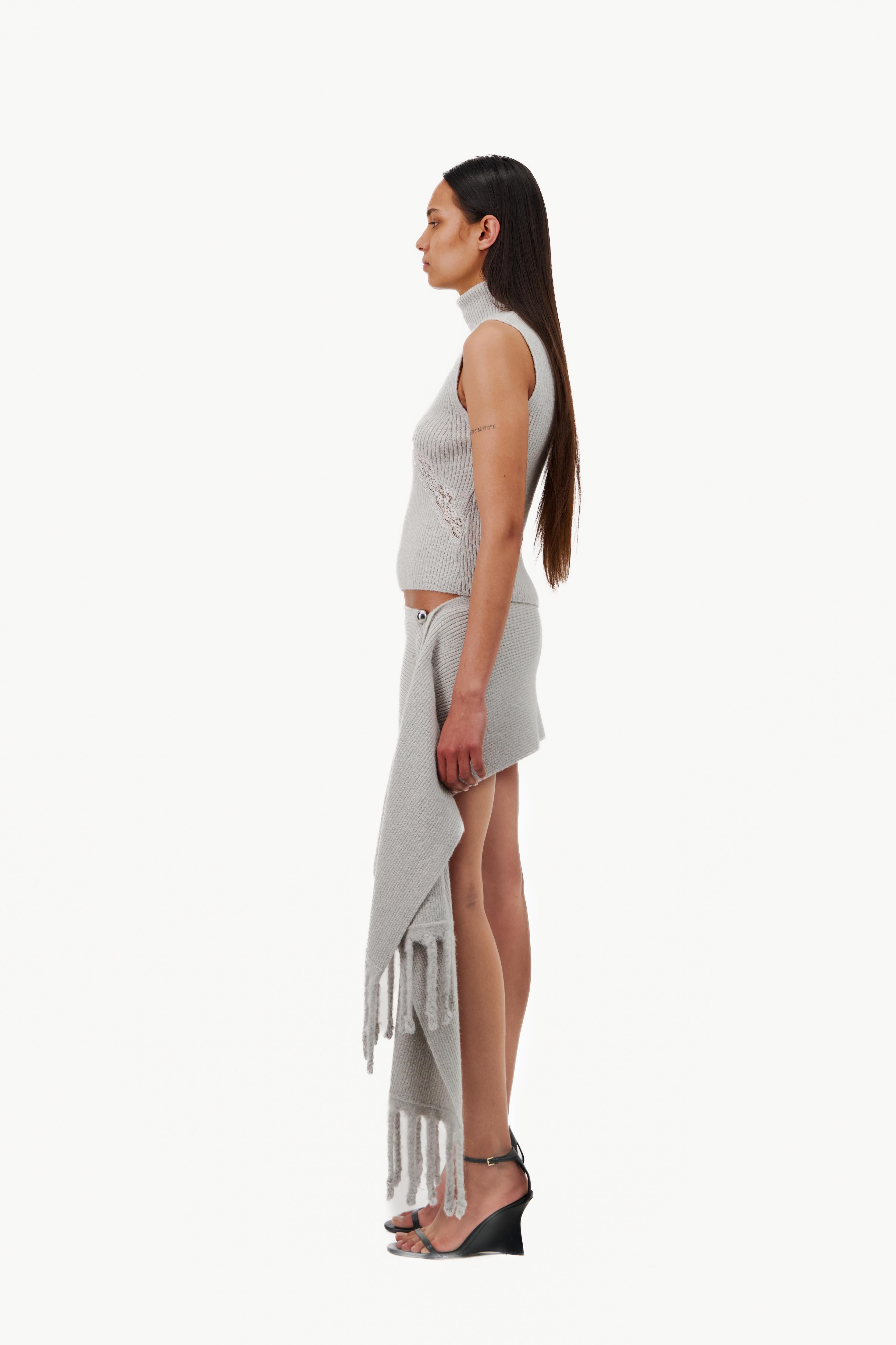 KNIT SCARF EFFECT MINI SKIRT WITH DOME BUTTONS – Vaillant Studio KNIT SCARF EFFECT MINI SKIRT WITH DOME BUTTONS – Vaillant Studio